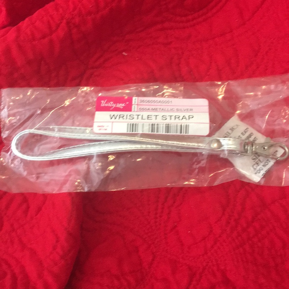 Thirty one wristlet strap in metallic silver